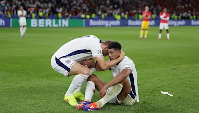 Shattered England stars are consoled by their families and WAGs