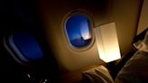 The scary reason lights are dimmed on flights during takeoff and landing