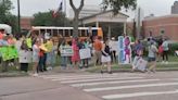Parents protest outside Herod Elementary School after HISD principals and staff terminations