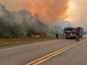 Crews continue to battle brush fire in Volusia County