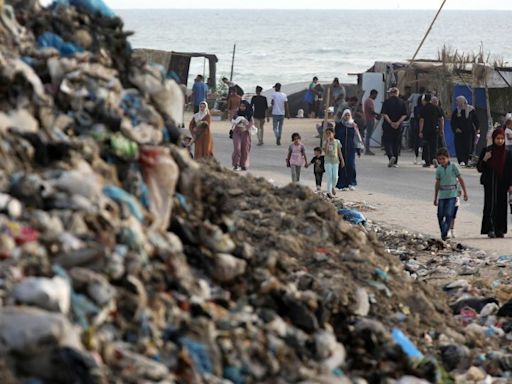 Flies, mosquitoes, raw sewage and mountains of garbage threaten to worsen Gaza’s health crisis