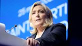 Marine Le Pen's National Rally to lead snap elections, trusted most on economy, polls show