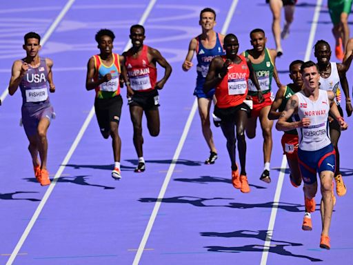 WATCH: Cameraman moseys onto Olympic track during men's 5000m race, nearly crashes into runners