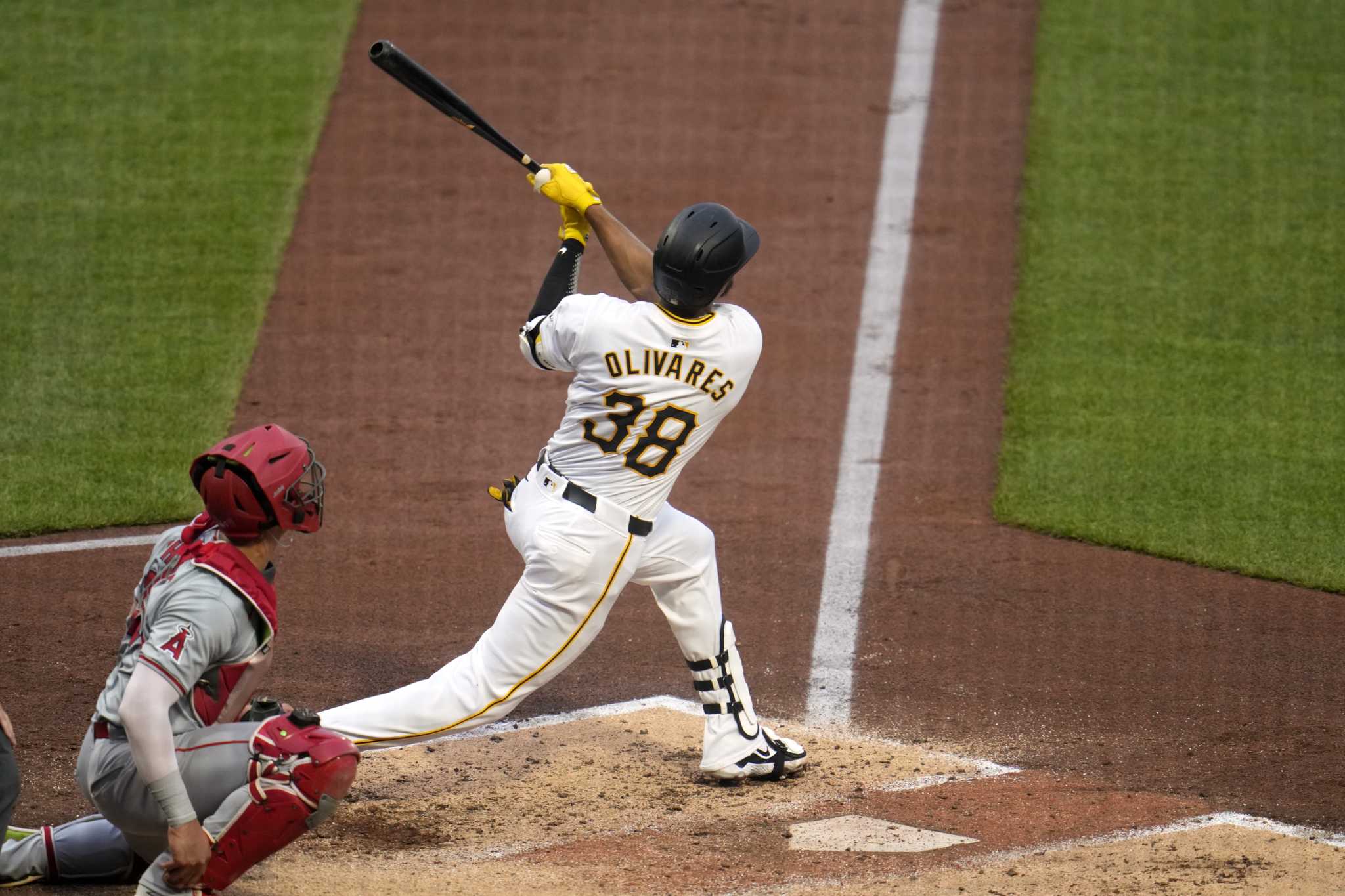 Edward Olivares' grand slam and Mitch Keller's complete game lead Pirates over Angels 4-1