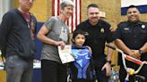 First group of Jefferson Elementary students presented bicycles found in school basement in Kenosha