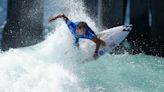 Paris Games could include the sight of helmet-wearing surfers on huge waves in Tahiti