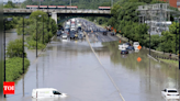 A major highway and roads are flooded as torrential rains hit Canada's largest city - Times of India