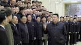 North Korea's Kim inspects spy satellite photos of 'target regions', US bases