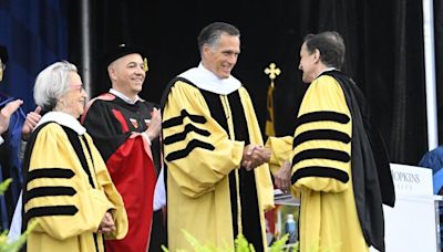 ‘We are a resilient nation’: Mitt Romney’s commencement speech at Johns Hopkins briefly interrupted by protesters