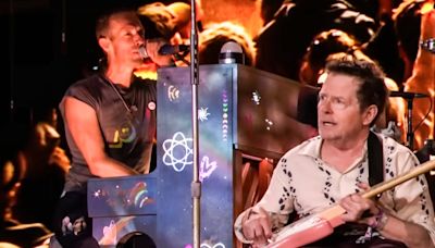 Michael J. Fox makes surprise guitar performance with Coldplay at the Glastonbury Festival