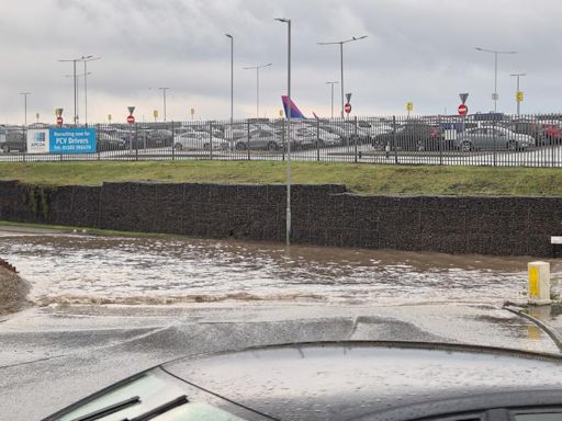 Floods leave UK airport 'totally inaccessible' with huge queues 'for miles'