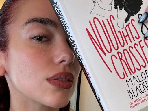 Dua Lipa's Service95 Book Club Reveals July Monthly Read: 'Noughts & Crosses' by Malorie Blackman
