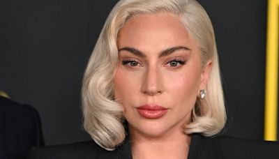 Lady Gaga Took Her Harley Quinn Persona Off-Screen With A Dramatic Red Bob Haircut