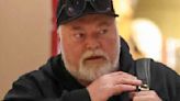 Kyle Sandilands' son Otto helps his mum wheel Louis Vuitton suitcase