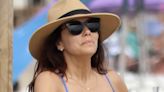 Eva Longoria kisses husband Jose Antonio at the beach in Marbella