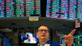 Stock market today: US stocks slip amid earnings rush, Fed teeters