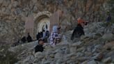 Faithful honor Jesus Christ's sacrifice for humanity through Mount Cristo Rey pilgrimage