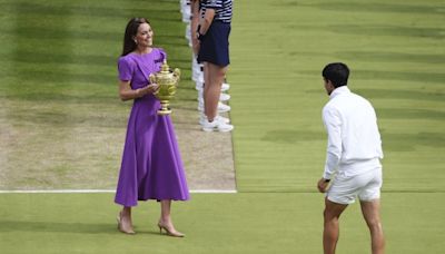 Kate, the Princess of Wales, hands Carlos Alcaraz his Wimbledon trophy in a rare appearance for her