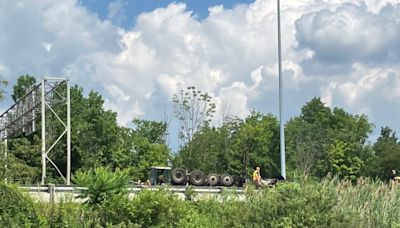 Truck overturns on I-77, restricts traffic; injured driver transported to hospital
