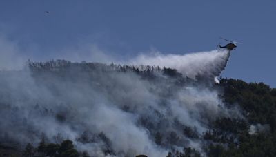 Greek Firefighters Battle Large Wildfire Southeast of Athens