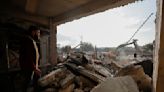 Aid to quake-hit Syria slowed by sanctions, war's divisions