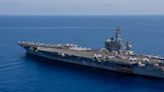 A US Navy aircraft carrier is rearmed and back in the Red Sea amid a Houthi missile crisis with no end in sight