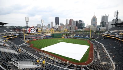 Saturday's Cubs-Pirates game goes into a rain delay after a wild sequence