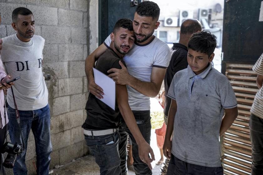 He went to register the birth of his twins. He returned to find them killed in an Israeli strike