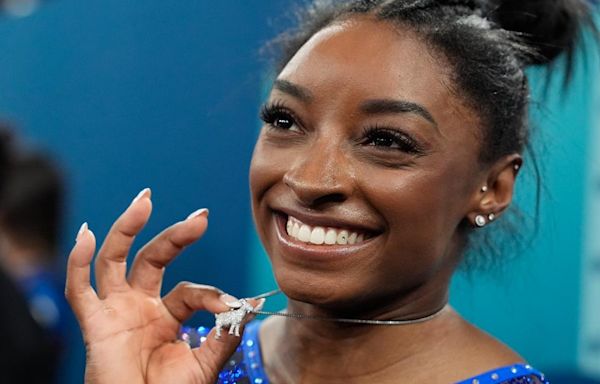 Simone Biles rocks G.O.A.T. necklace as she won gold medal for women's all-around at 2024 Paris Olympics