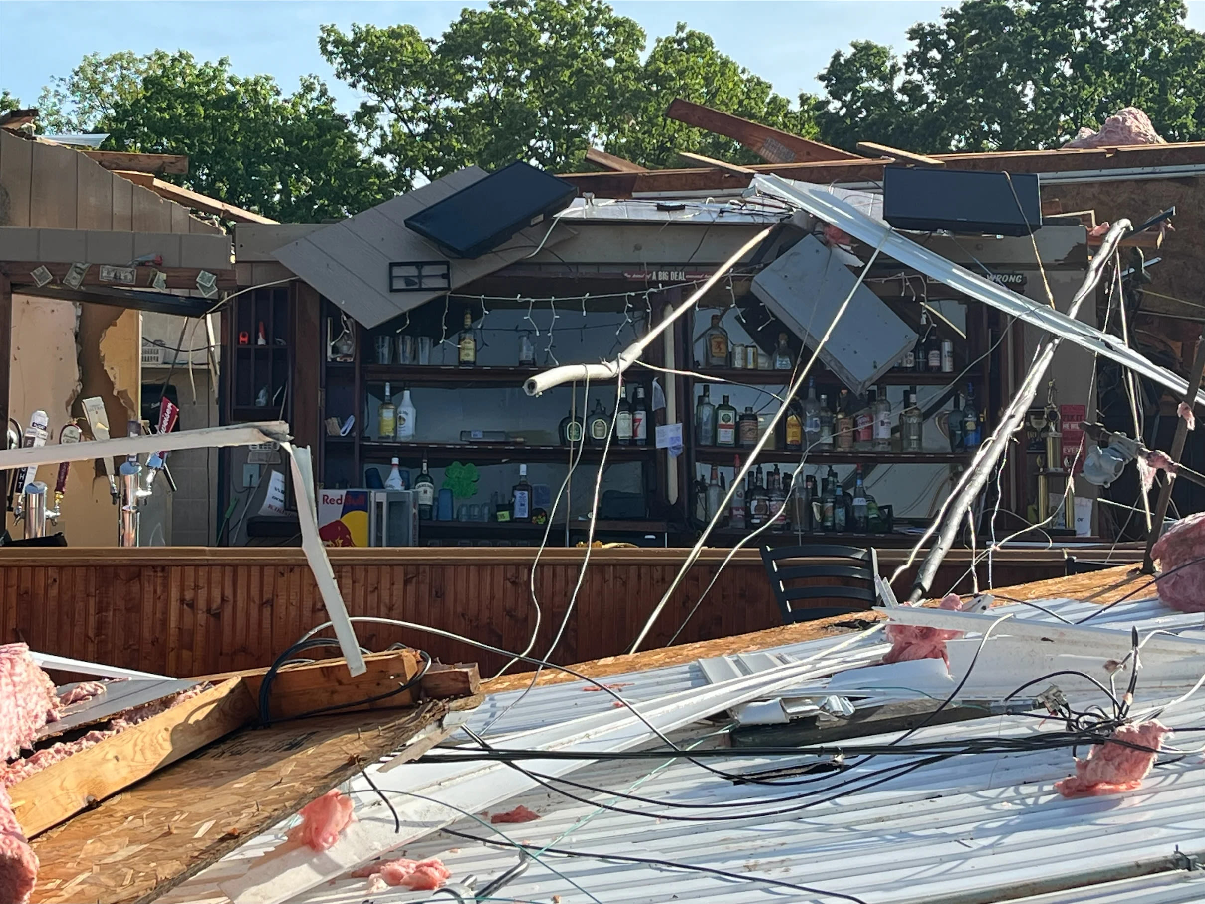 Tornado destroys beloved Missouri pub but leaves some bottles standing
