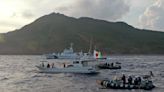 Japan sights China, Russia warships near disputed islands