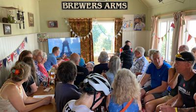 Cheers at pub as mountain biker competes in Olympics