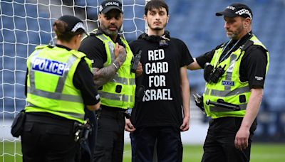 Scotland Women's clash vs Israel DELAYED as man chains himself to post