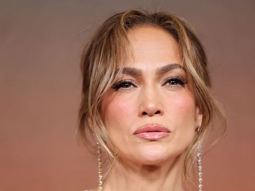 Jennifer Lopez oozes Y2K vibes in all-white outfit and chunky brown belt