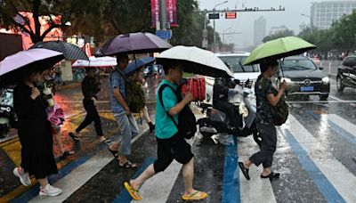 En Chine, des pluies torrentielles font au moins 30 morts, canicule à Shanghai