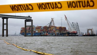 Demolition to remove part of Baltimore’s Key Bridge to free trapped ship postponed until Monday due to inclement weather