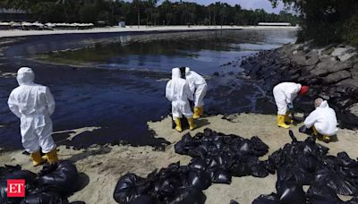 Singapore travel alert: Sentosa struggles to clean up oil spill coating beaches - Oil spill