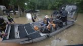 Hundreds are rescued from their homes after Houston area flooding