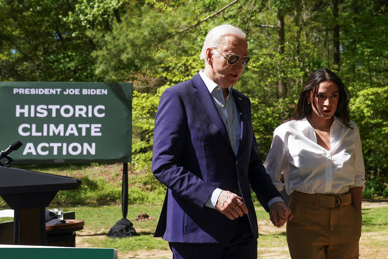 AOC rallies to Biden's side as progressives split over backing his 2024 campaign