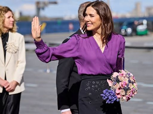 Mary is marvellous in mauve! Queen of Denmark stuns in purple as she carries out solo engagements