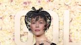 Rosamund Pike's Golden Globes Veil Is Fit For a 'Saltburn'-Level Funeral