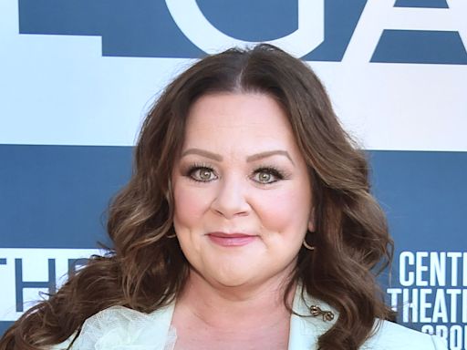 Melissa McCarthy shows off slimmer figure in ruffled princess gown