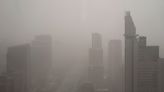 Northern China blanketed with floating sand and dust