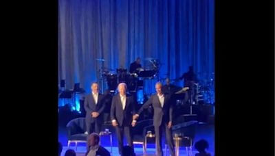 Video: Joe Biden Freezes At Fundraiser, Barack Obama Guides Him Off Stage