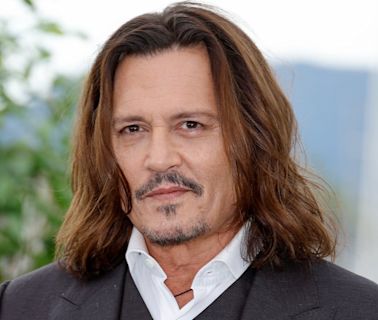 Johnny Depp shows off major dental transformation after shocking fans with ‘rotting’ teeth