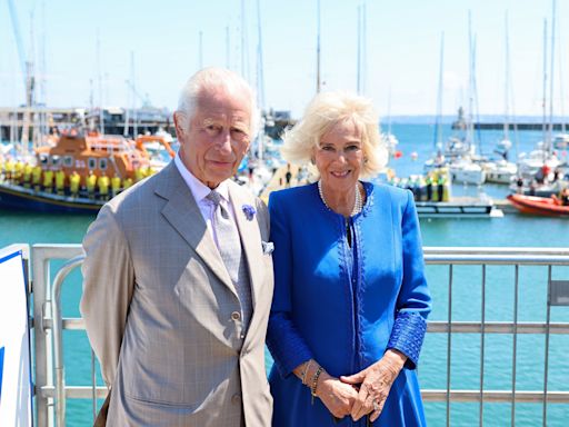 King samples a glass of ‘Charles’ ale on trip to Guernsey