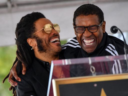Lenny Kravitz Stops Concert to Answer FaceTime Call From 'Brother' Denzel Washington