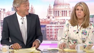 GMB's Kate Garraway caught on her phone on air as she deals with 'home crisis'