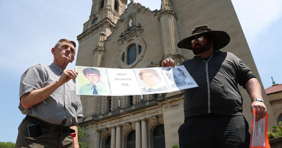 Protesters call for Omaha archbishop to be suspended. Archbishop says accusation are 'a complete fabrication'