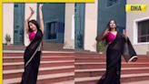 Viral video: Saree-clad woman grooves to 'Tip Tip Barsa Pani' at collectorate building, faces backlash